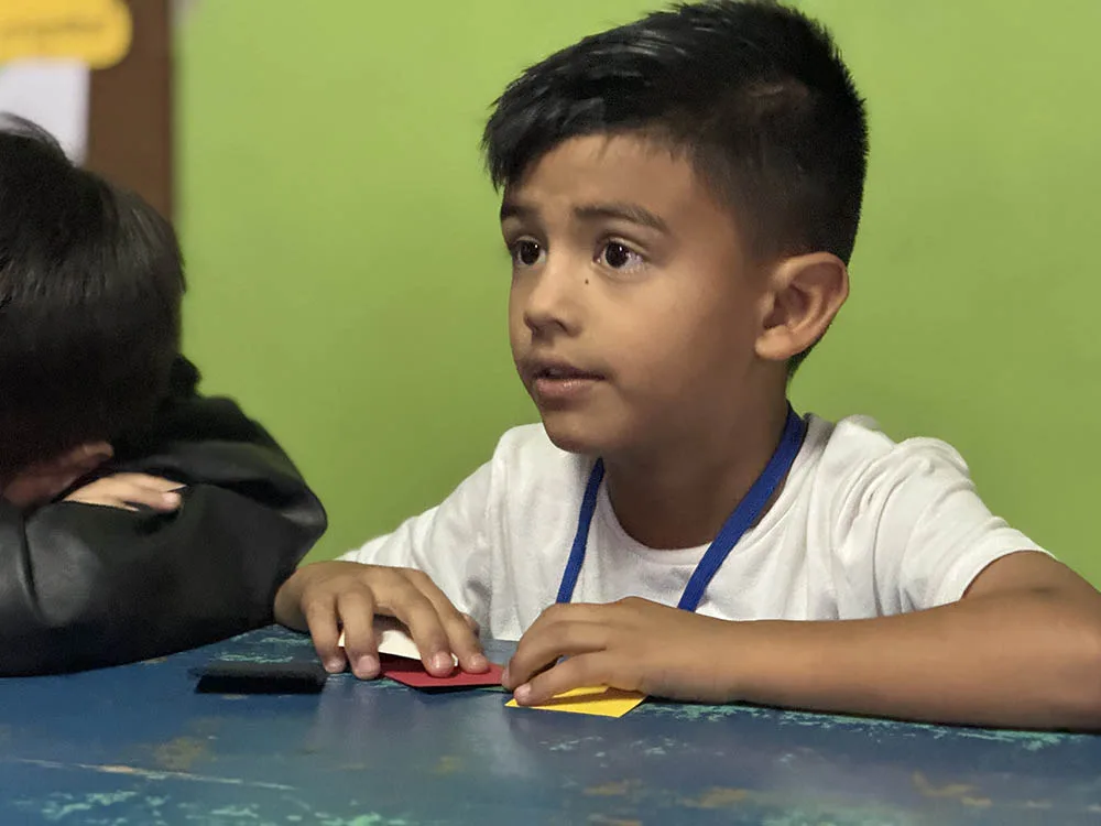 international-3 A boy participates in an international Crossroads club lesson.