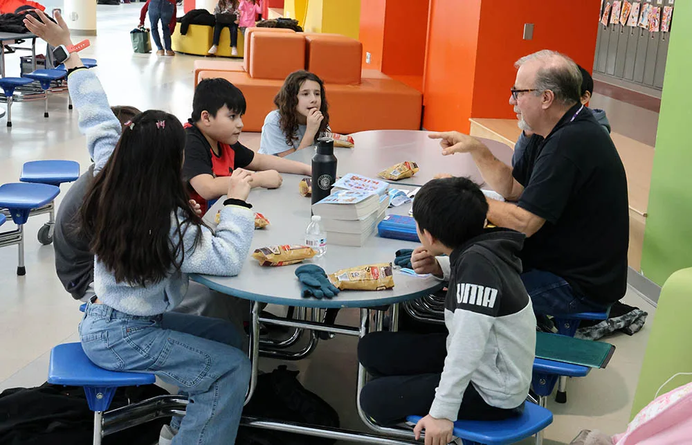 opening small group Children in an opening small-group circle at a Crossroads Kids Club