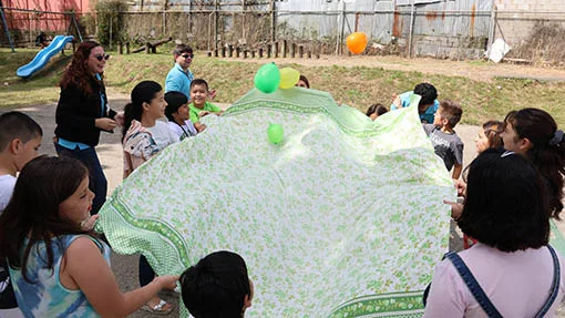 story-going-where-the-children-are Leaders walking into a school to reach children